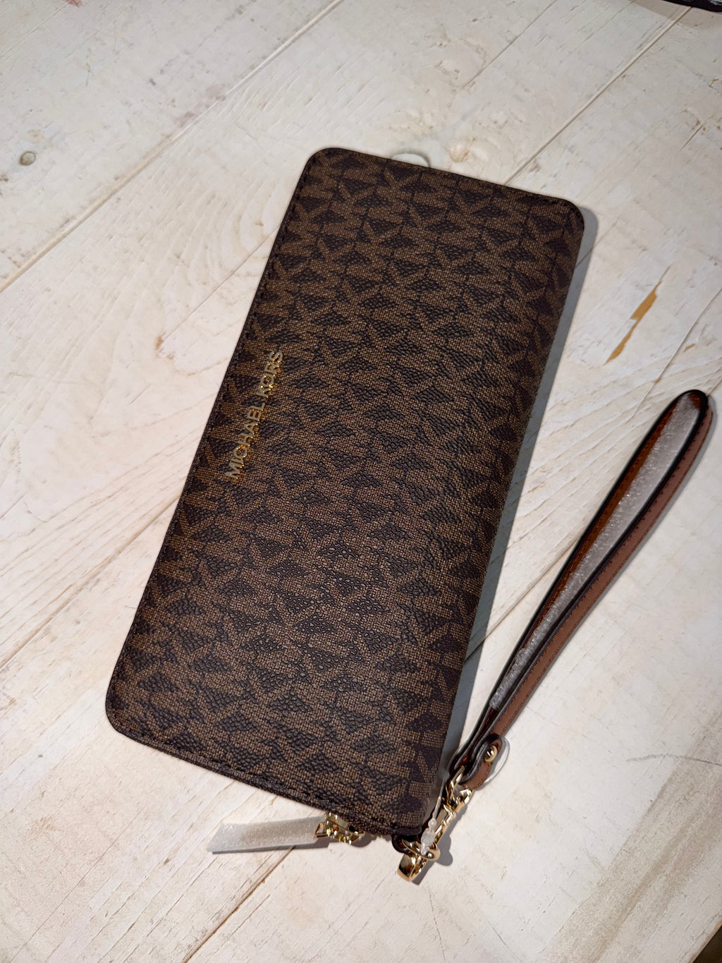Cartera de mano Michael Kors Jet Set Travel marrón