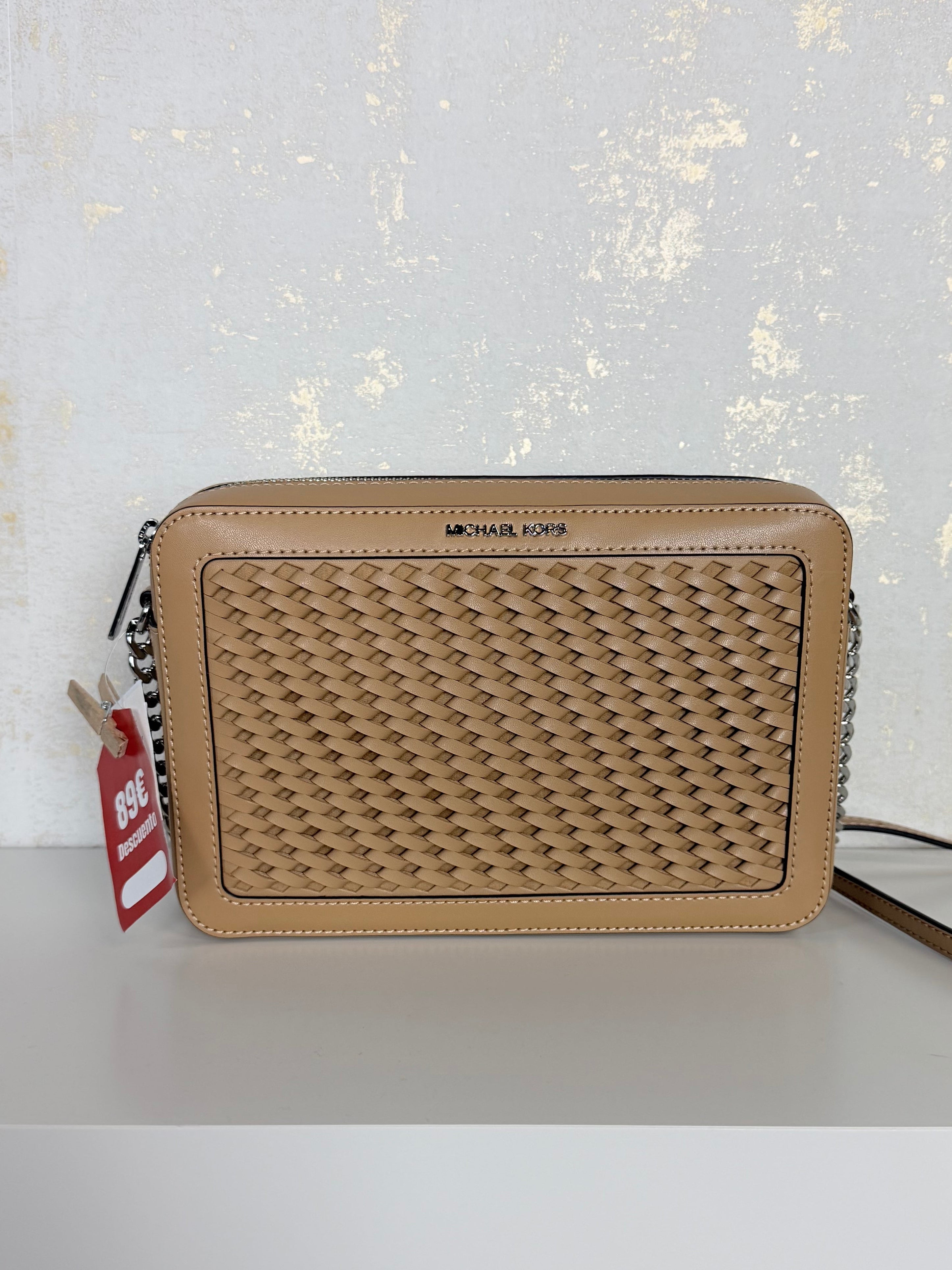 Bandolera Michael Kors jet set travel trenzada