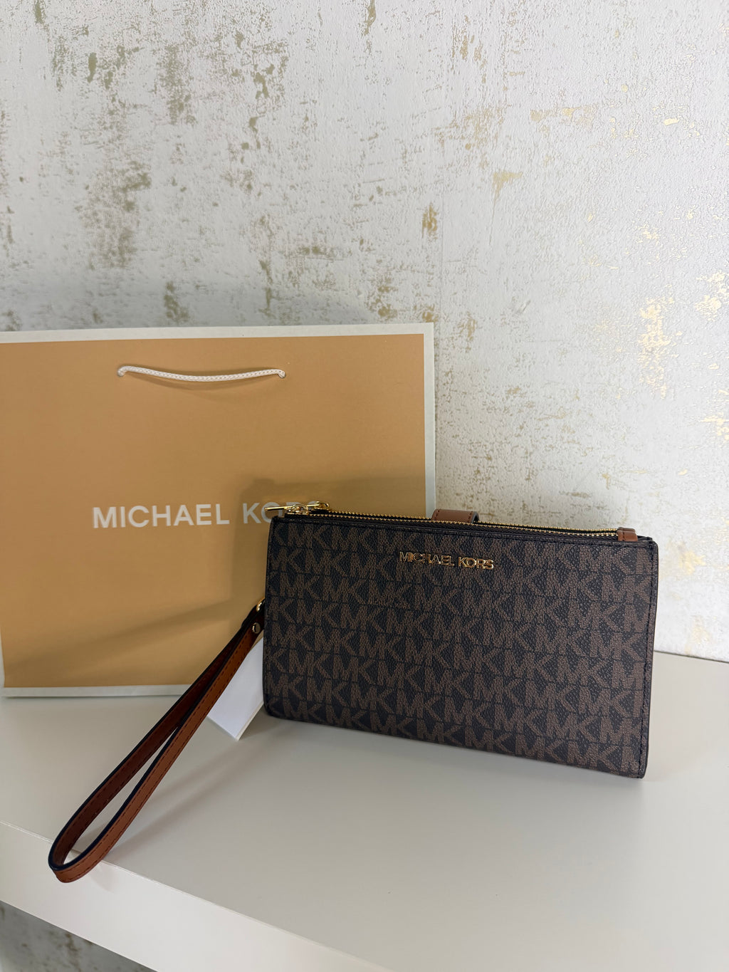 Cartera de mano Michael Kors Jet Set Travel en color brown