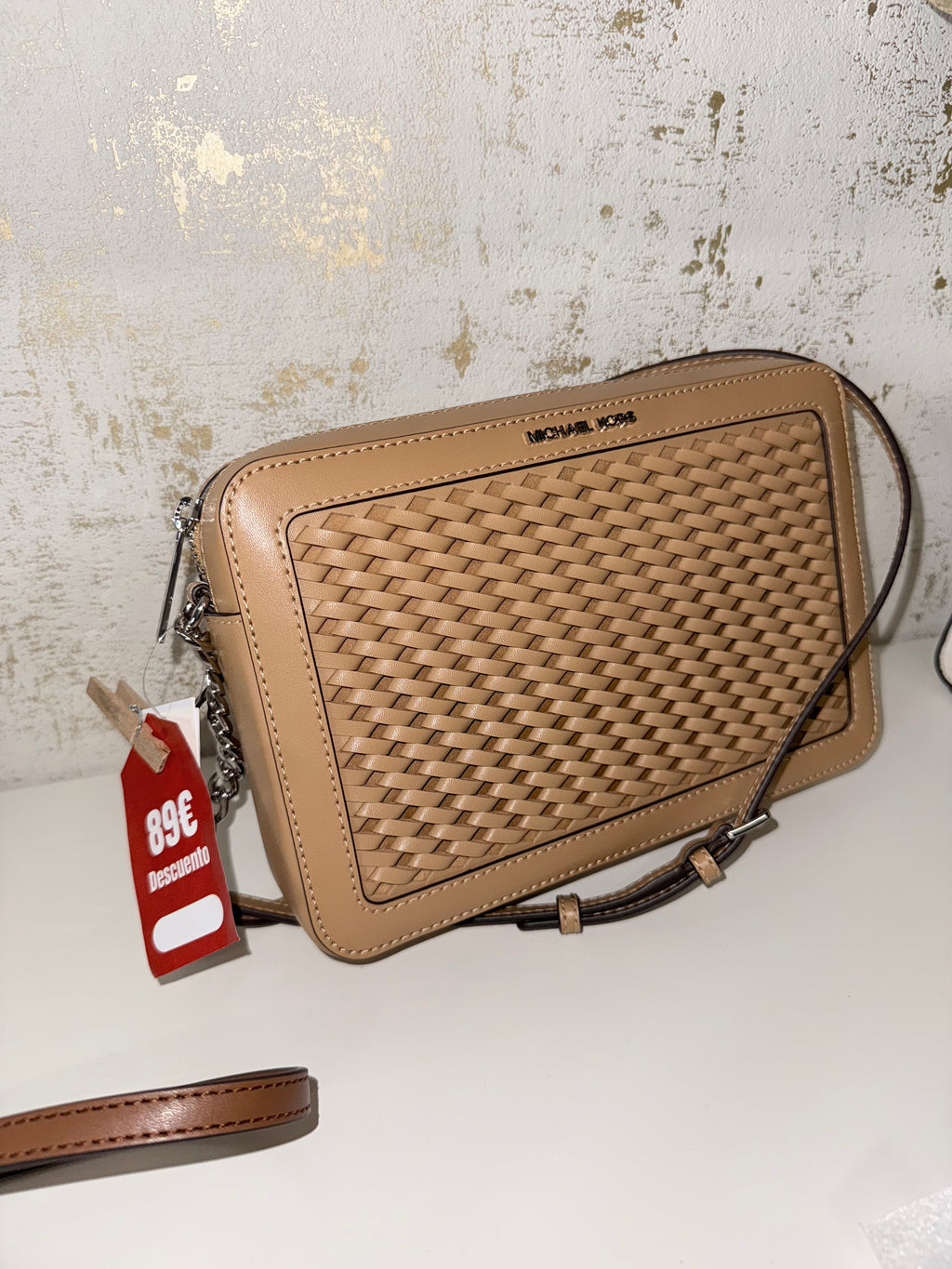 Bandolera Michael Kors jet set travel trenzada