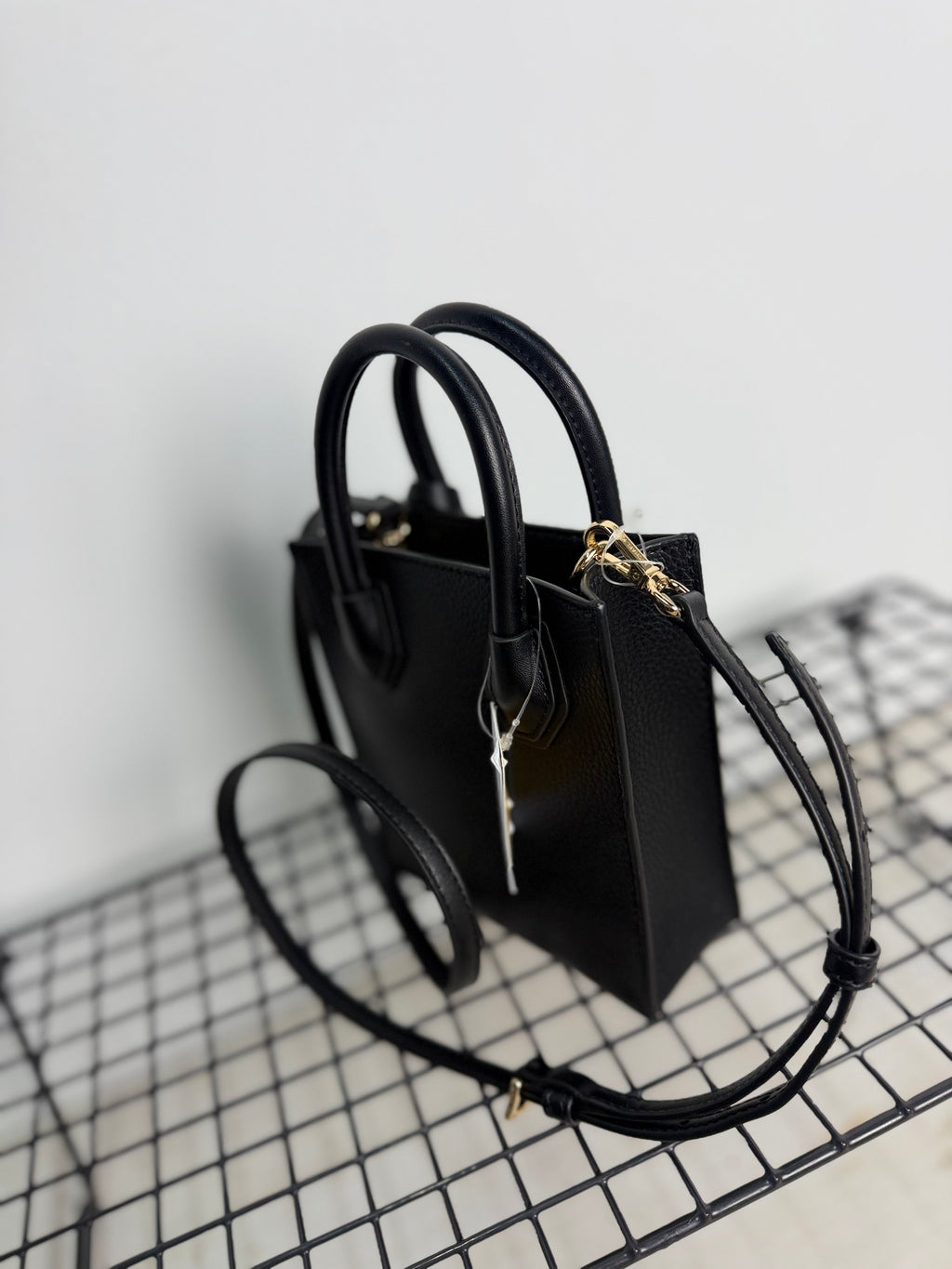 Bolso Michael Kors Mercer Extra Small – Negro