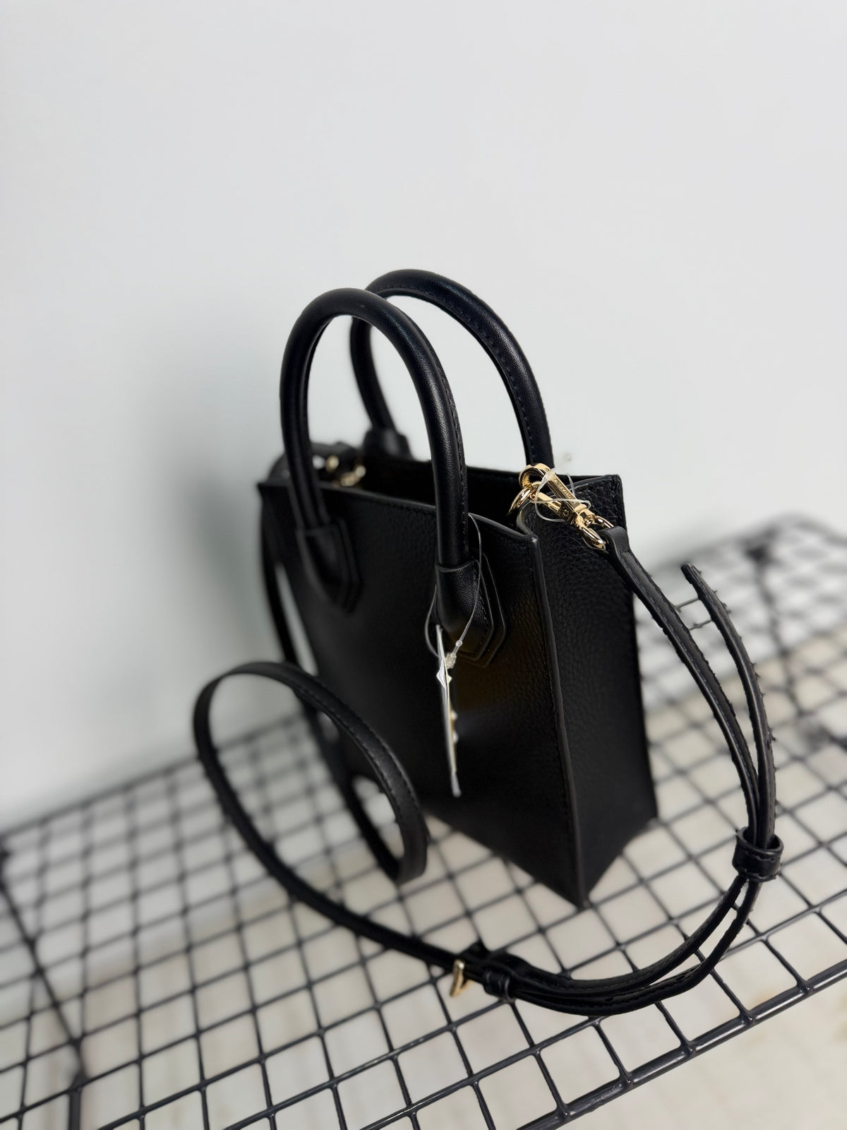 Bolso Michael Kors Mercer Extra Small – Negro